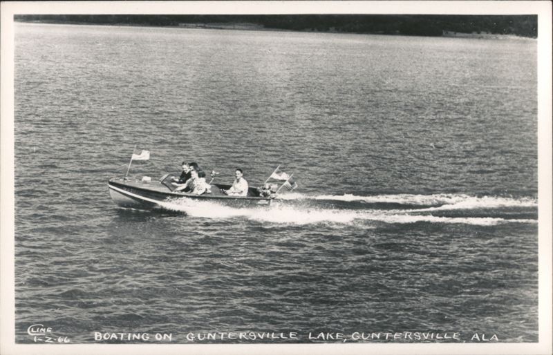 Boating on Guntersville Lake, speed boat with passengers Alabama