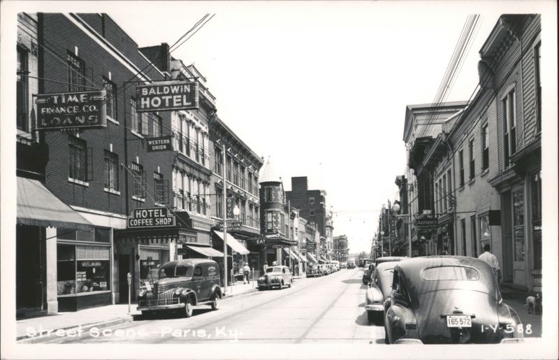 Street Scene Paris, KY with Baldwin Hotel, shops, and vintage automobiles Kentucky