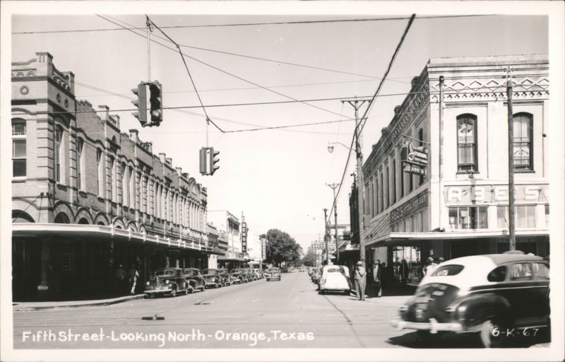 Fifth Street Looking North with vintage cars and buildings Orange Texas