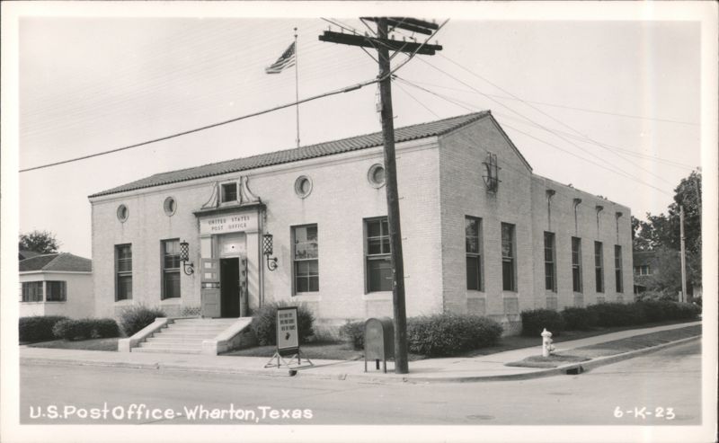 U.S. Post Office building with American flag, Wharton, TX Texas