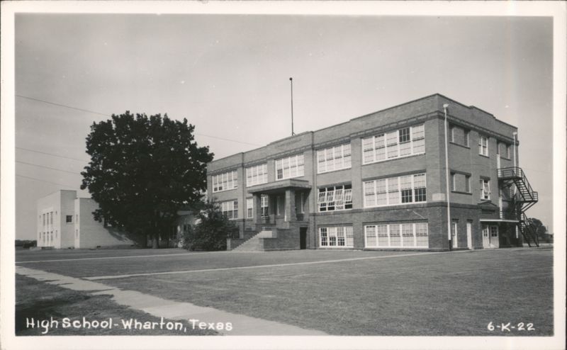 High School Building with Grassy Lawn and Tree Wharton Texas