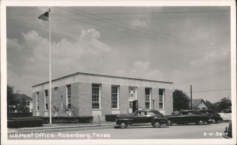 U.S. Post Office Building with American Flag and Cars Rosenberg Texas