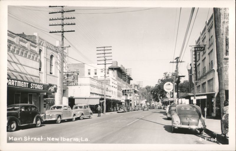 Main Street with Cars and Storefronts New Iberia Louisiana