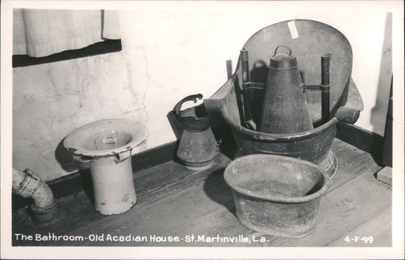 Bathroom in Old Acadian House with Toilet and Metal Basins Saint Martinville Louisiana