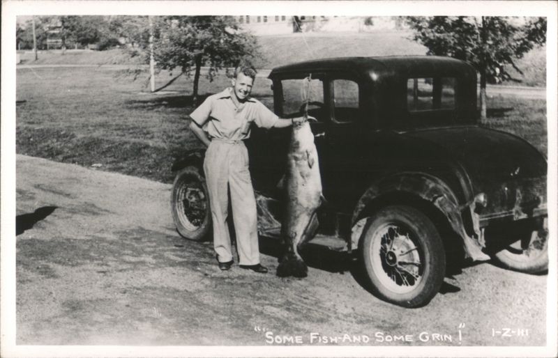 Man with huge fish and vintage car, 'Some Fish-And Some Grin Tennessee