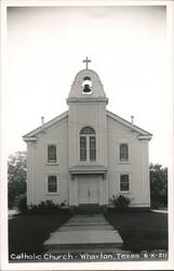 White Wooden Catholic Church with Bell Tower and Cross Postcard