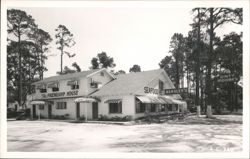 The Friendship House & Beasley's Seafood Restaurant with Dinty Moore's sign Postcard