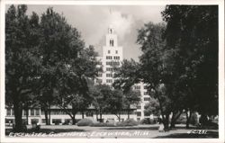 Edgewater Gulf Hotel with Tower and Lush Trees Postcard