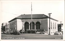 U.S. Post Office building with arched windows and flag pole Postcard