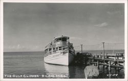 The Gulf Clipper boat docked at a pier Postcard
