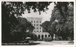 Tivoli Hotel with Lush Grounds and Spanish Moss Trees Postcard