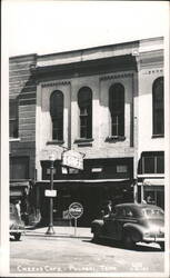 Cheeks Cafe with Coca-Cola Sign and Cars Postcard