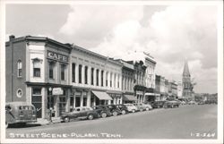 Street Scene with Cafe, Hardware Store, and Church Steeple Postcard