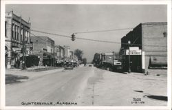 Main Street View with Businesses and Cars, Guntersville Postcard