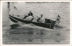 Boating on Guntersville Lake with American flags Postcard