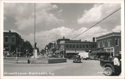 Street Scene with Cars and Businesses, Monticello Postcard