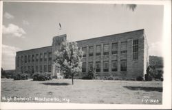 Monticello High School, Stone Building with Flagpole Postcard