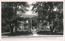 Home of Dr. Boyd Ceudill with large trees and columned portico Postcard