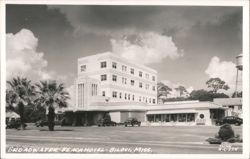 Broadwater Beach Hotel, Palm Trees, and Vintage Cars Postcard