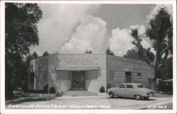 Fairchild's Dutch Treat Building with Car Postcard