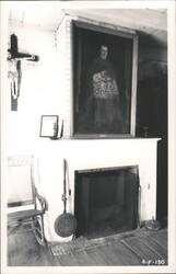 Interior Room with Painting of Clergyman, Crucifix, and Fireplace Postcard