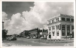Downtown Gulfport Street Scene with Historic Buildings and Cars Postcard