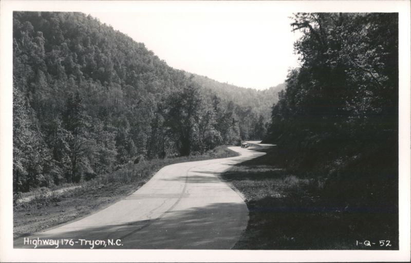 Highway 176 winding through forested mountains Tryon North Carolina