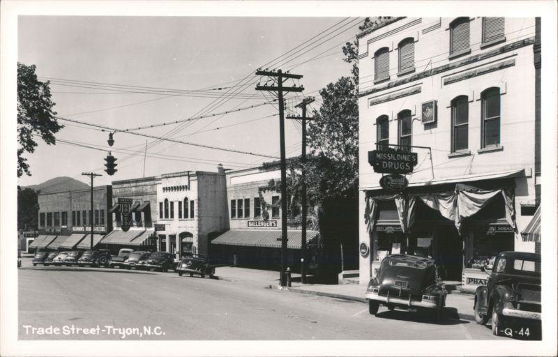 Trade Street with Missildine's Drugs, Ballenger's, and vintage cars Tryon North Carolina