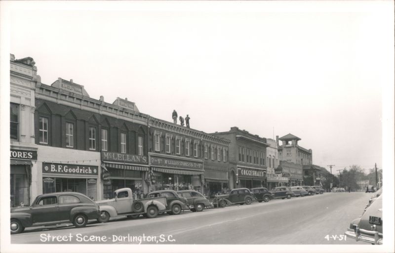 Darlington Street Scene with McLellan's, B.F. Goodrich, and men on roof South Carolina