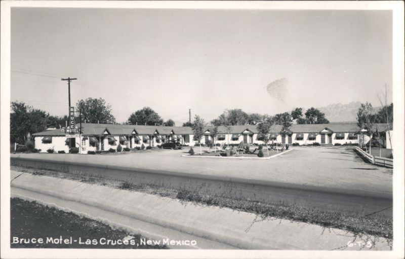 Bruce Motel, AAA, Air Conditioned, with parked cars and distant mountains Las Cruces New Mexico