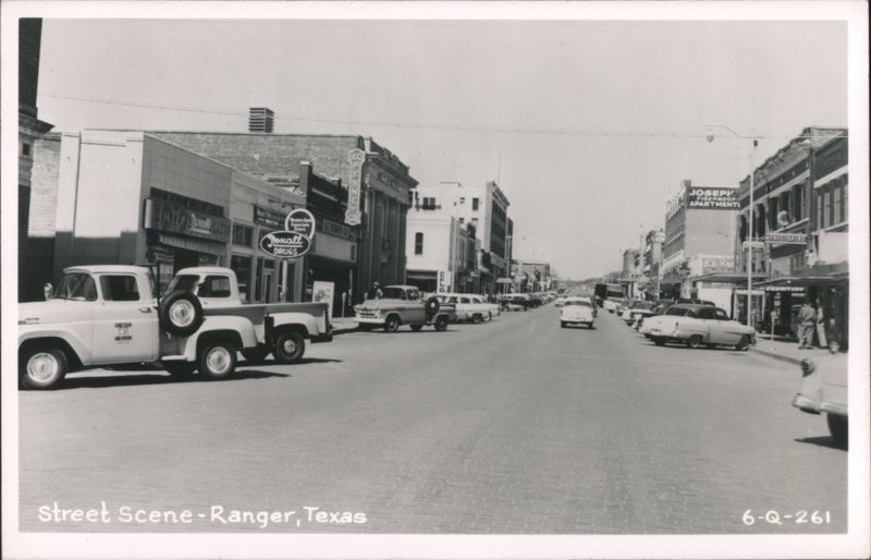 Street Scene with Rexall Drugs, Joseph Fireproof Apartments, and Cars Ranger Texas
