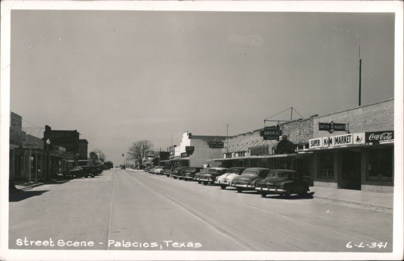 Street Scene with Palacios Drugs, K&M Market, and Parked Cars Texas