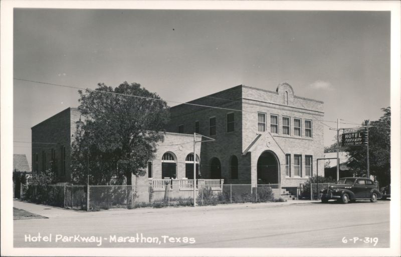 Hotel Parkway with vintage car, Marathon Texas