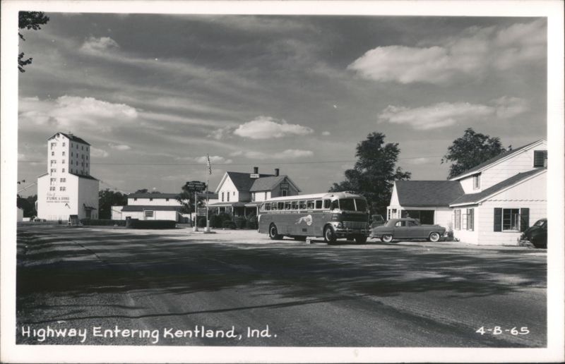 Highway Entering Kentland, IN with Greyhound Bus and Funk & Sons Building Indiana
