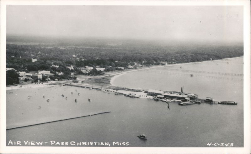 Air View of waterfront with piers, boats, and coastal buildings Pass Christian Mississippi