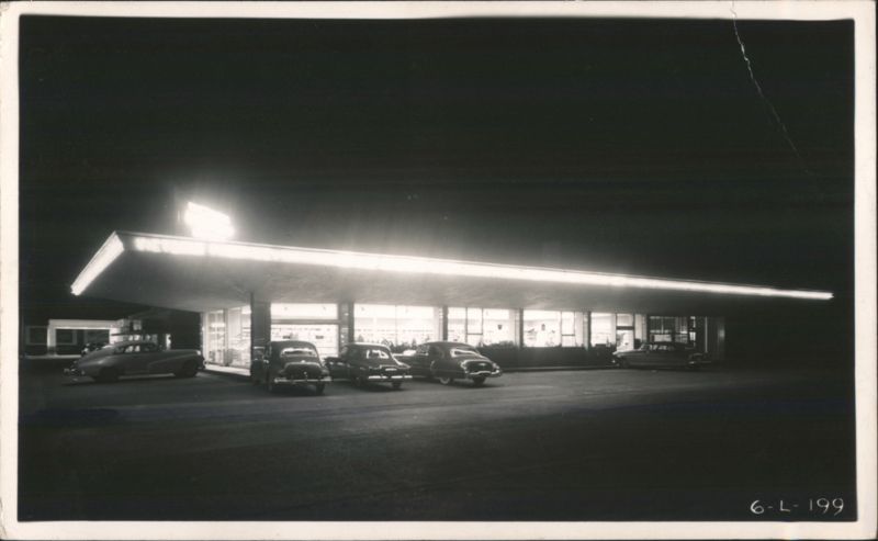 Victoria Pharmacy-Walgreen Agency at Night with Cars Texas