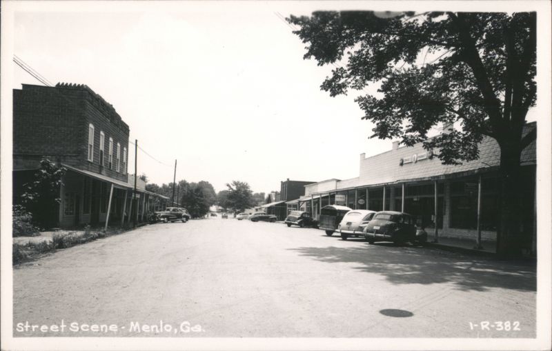 Street Scene with Vintage Cars and Shops Menlo Georgia
