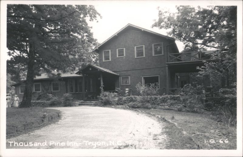 Thousand Pine Inn, large shingled building with gravel path and trees Tryon North Carolina
