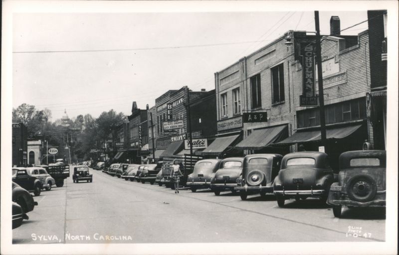 Downtown Sylva Street Scene with Businesses and Parked Cars North Carolina