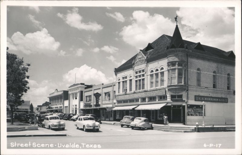Street Scene with C.G. Morrison & Co. Building and Vintage Cars Uvalde Texas