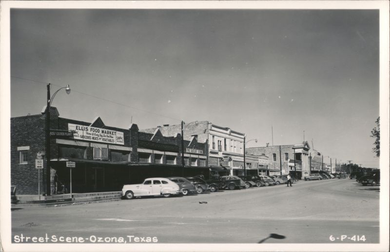 Street Scene with Ellis Food Market, C.C. Morrison & Co., and Parked Cars Ozona Texas