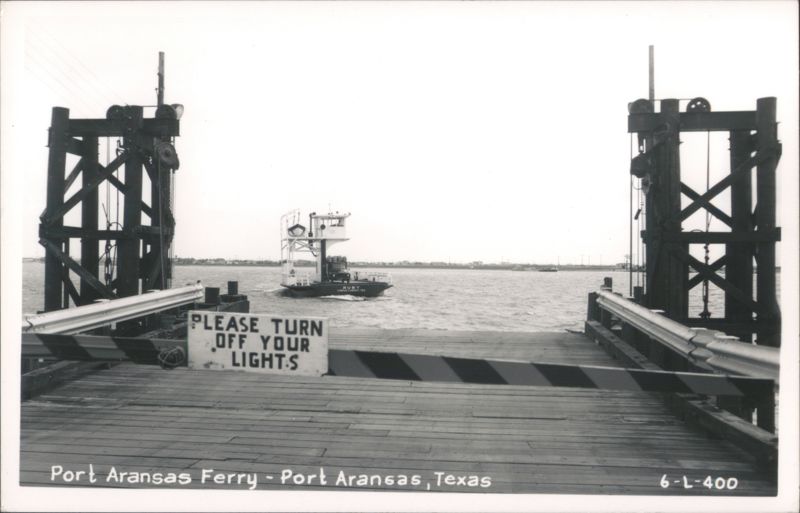 Port Aransas Ferry with 'Ruby' boat approaching dock Texas