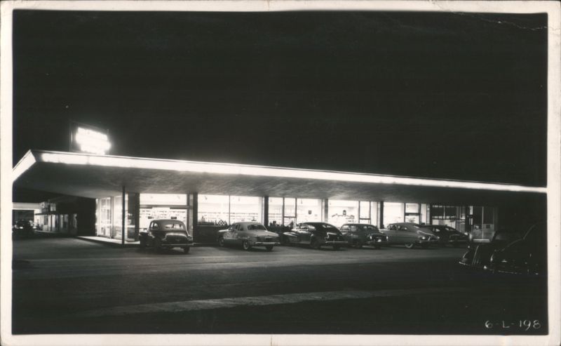 Victoria Pharmacy-Walgreen Agency at Night with Cars Texas