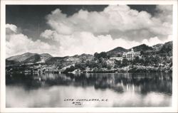 Lake Junaluska with Buildings on Hillsides and Cloudy Sky Postcard