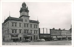 Darlington Street Scene with Clock Tower, Liberty Theatre, and Shops Postcard