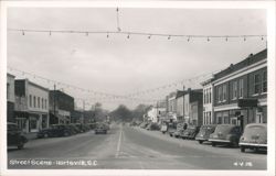Street Scene with Cars and Businesses, Hartsville Postcard