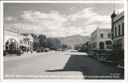 Alamogorda, NM Street Scene with Alamo Drugs, Corner Drugs & Sacramento Mts. Postcard