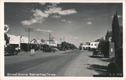 Street Scene with Businesses, Vintage Cars, and Texaco Station Postcard