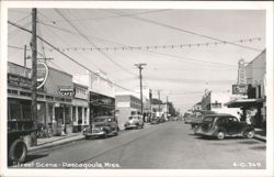Downtown Street Scene with Vintage Cars and Shops Postcard