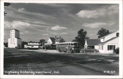 Highway Entering Kentland, IN with Greyhound Bus and Funk & Sons Building Postcard